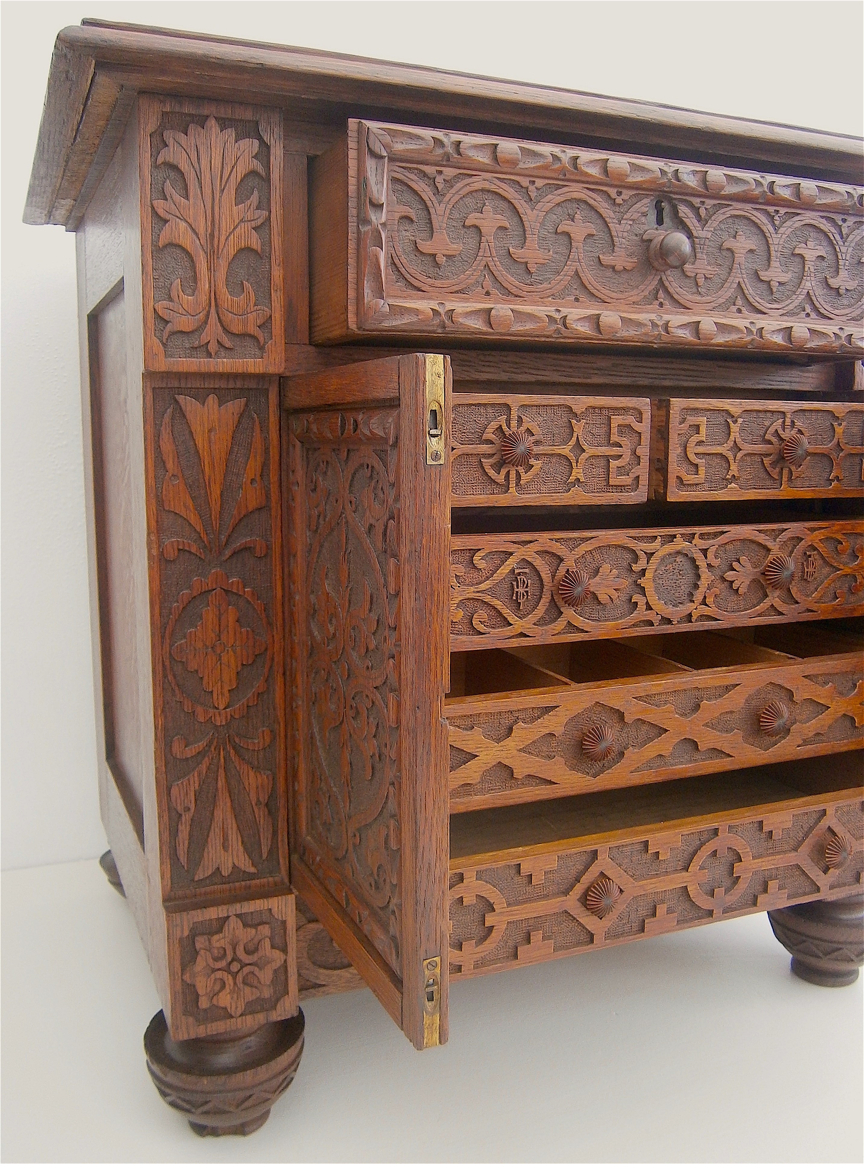 A Victorian carved oak table top collector's cabinet, width 58cm, depth 37cm, height 56cm